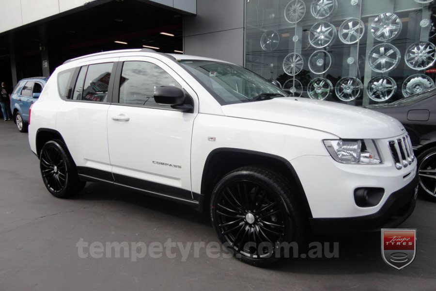White jeep compass with black rims