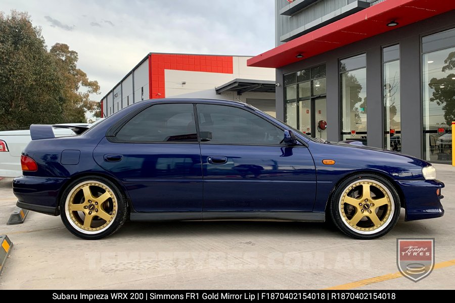 18x7.0 18x8.5 Simmons FR-1 Gold on Subaru Impreza