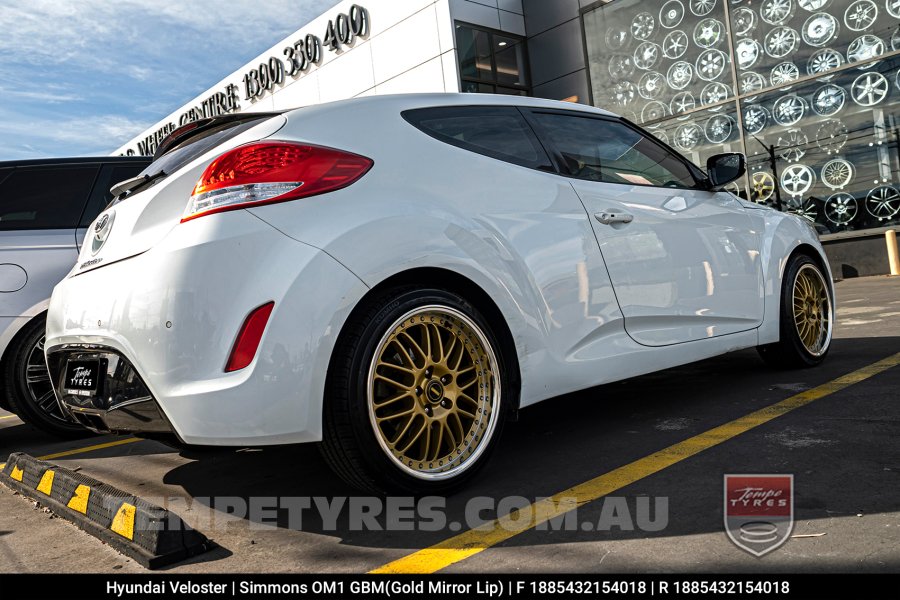 18x8.5 18x9.5 Simmons OM-1 Gold on Hyundai Veloster