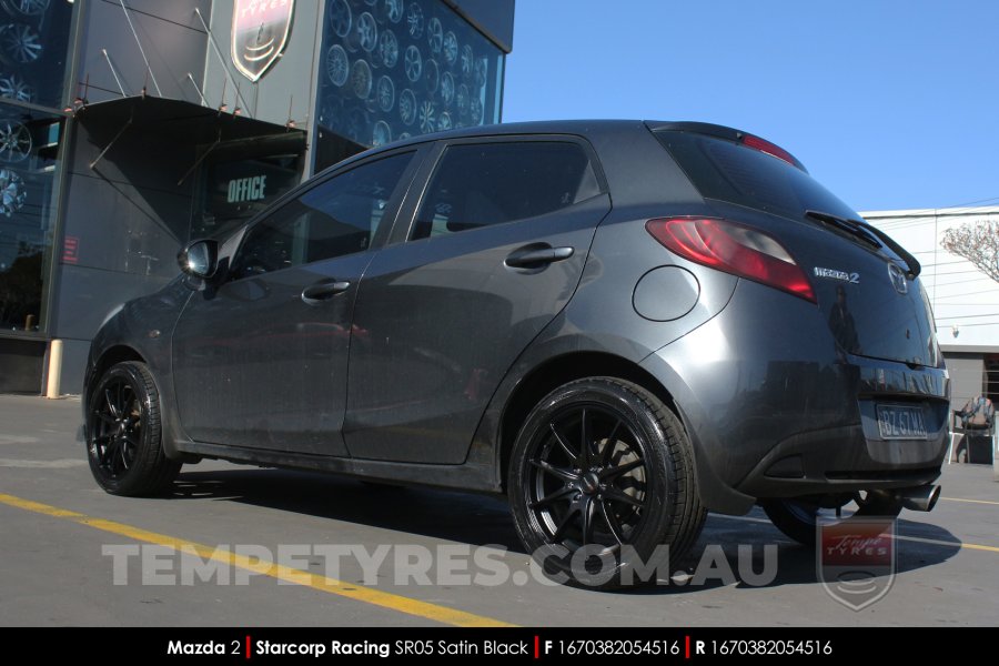 16x7.0 Starcorp Racing SR05 Satin Black on Mazda 2