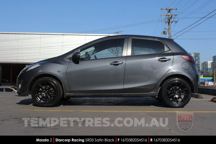 16x7.0 Starcorp Racing SR05 Satin Black on Mazda 2