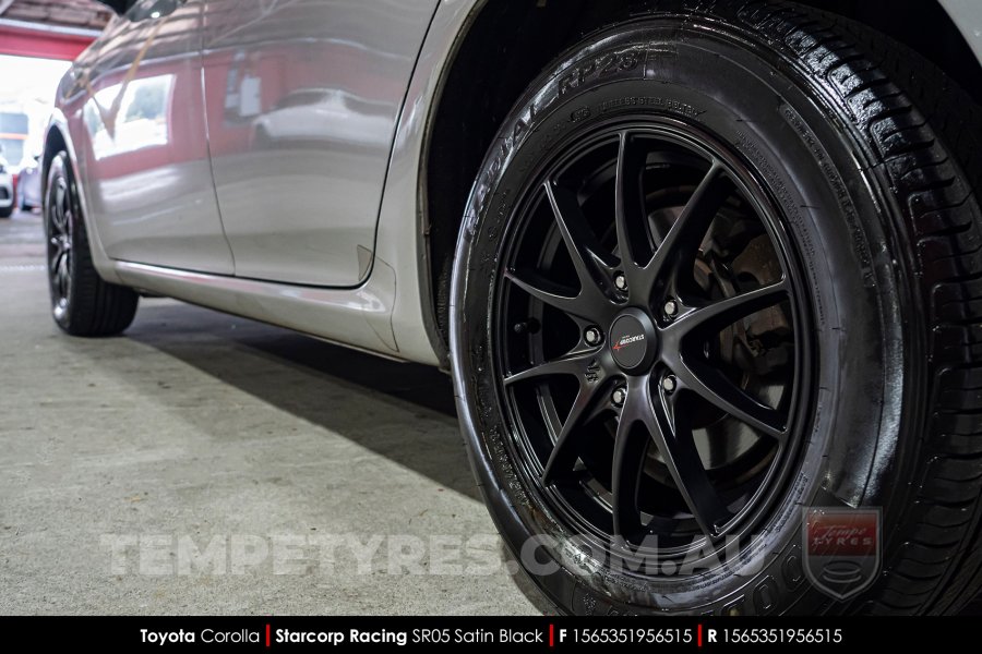 15x6.5 Starcorp Racing SR05 Satin Black on Toyota Corolla