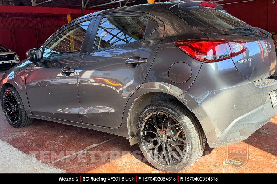 16x7.0 SC Racing XF201 Black on Mazda 2