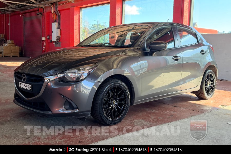 16x7.0 SC Racing XF201 Black on Mazda 2