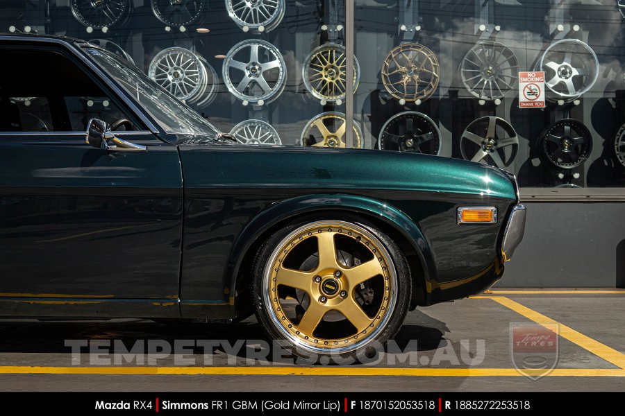 18x7.0 18x8.5 Simmons FR-1 Gold on Mazda RX4