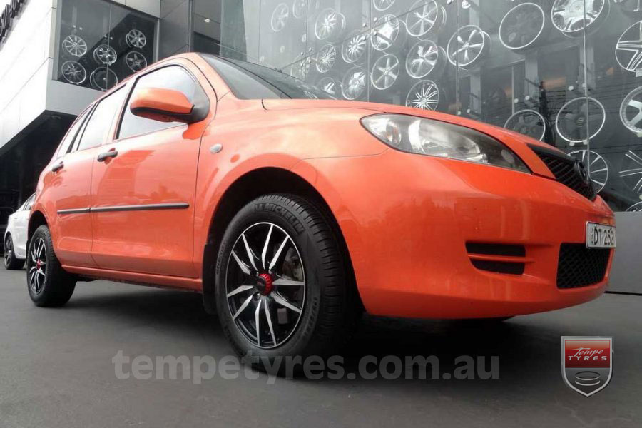 15x6.5 Menzari 0469 on MAZDA 2