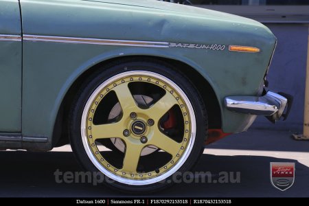 18x7.0 18x8.5 Simmons FR-1 Gold on Nissan Datsun