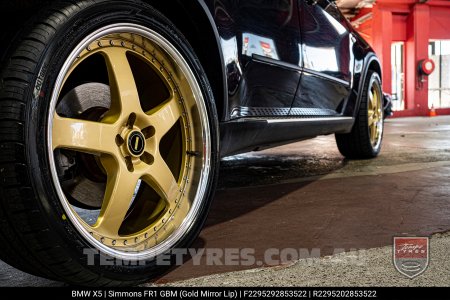 22x8.5 22x9.5 Simmons FR-1 Gold on BMW X5