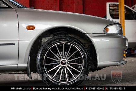 15x7.0 Starcorp Racing L560 HEAT on Mitsubishi Lancer