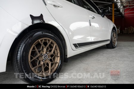 15x6.5 SC Racing DX552 Bronze on Mazda 2
