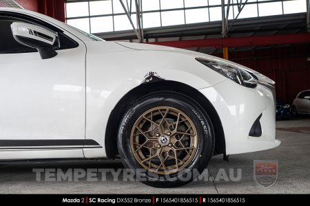 15x6.5 SC Racing DX552 Bronze on Mazda 2