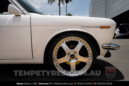 18x7.0 18x8.5 Simmons FR-1 Silver on Nissan Datsun