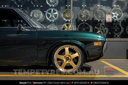 18x7.0 18x8.5 Simmons FR-1 Gold on Mazda RX4