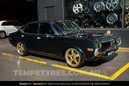 18x7.0 18x8.5 Simmons FR-1 Gold on Mazda RX4